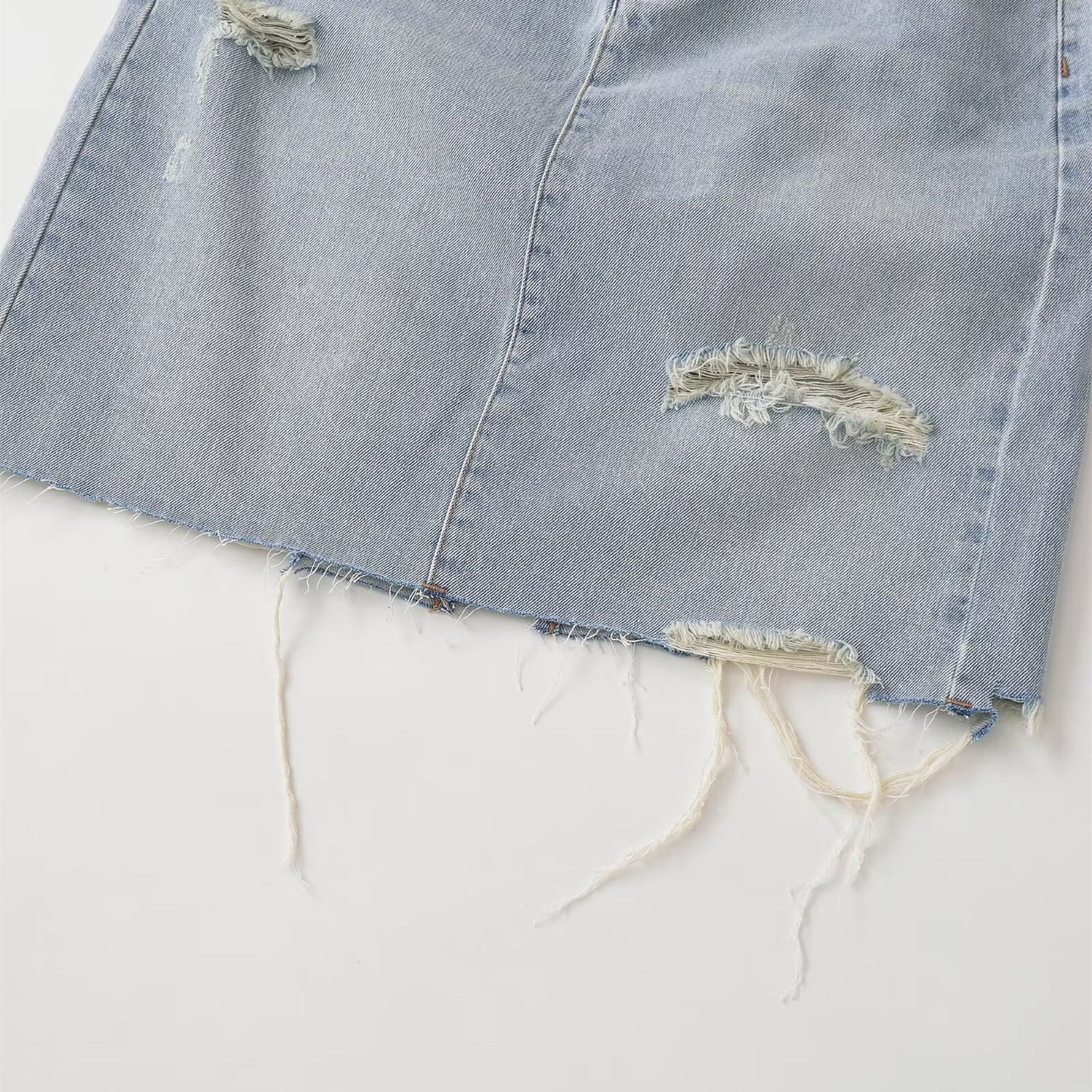 Mid waist perforated casual denim skirt by eprolo