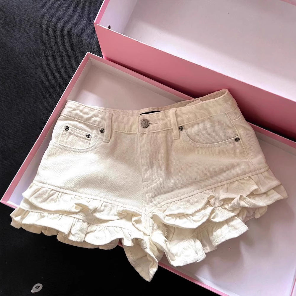 White Ruffled Panel Denim Shorts by Royal Closet