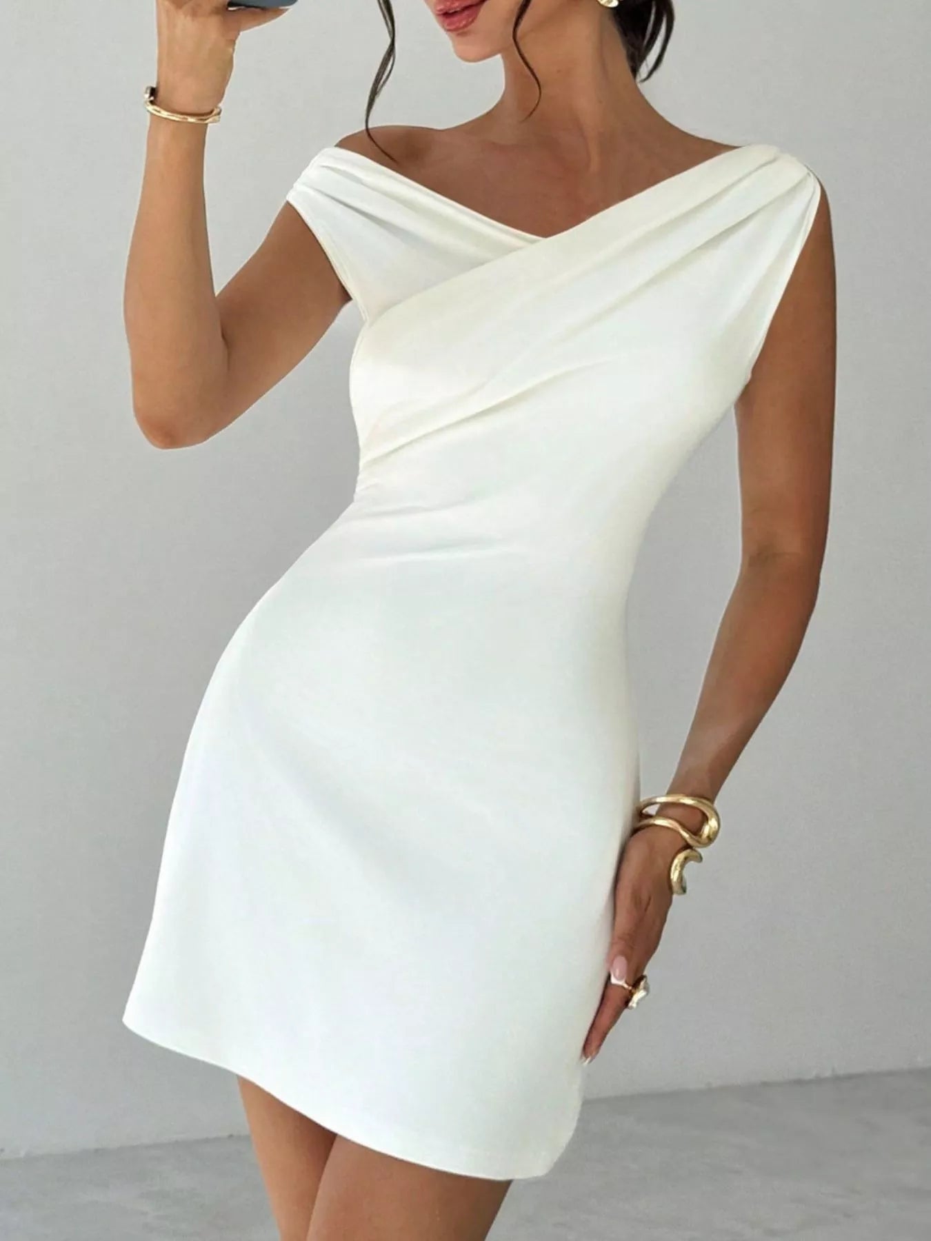 Elegant Off-Shoulder Draped Mini Dress by Trendsi