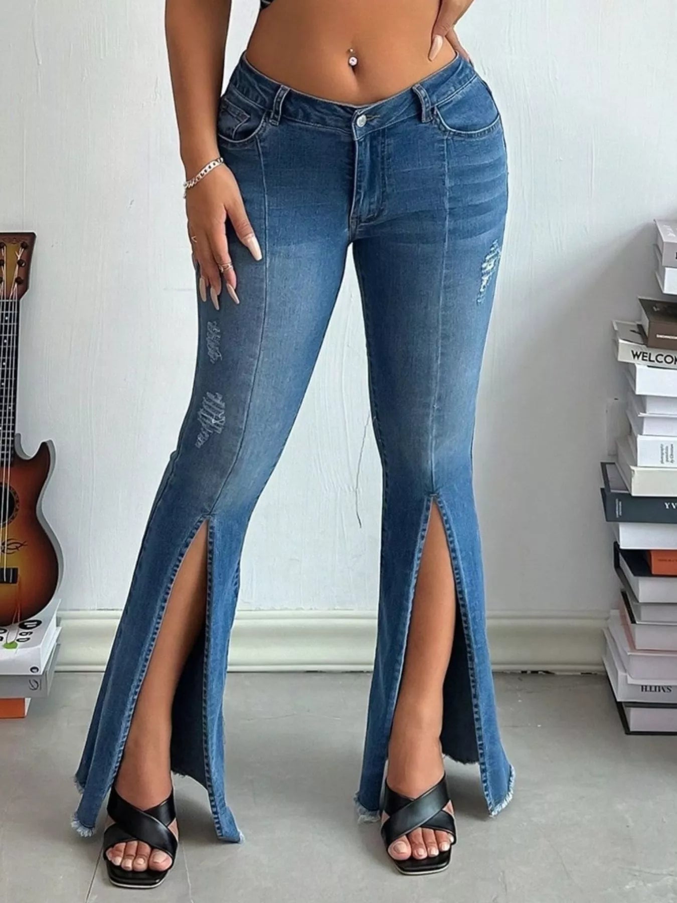 Distressed Slit Flare Jeans by Trendsi