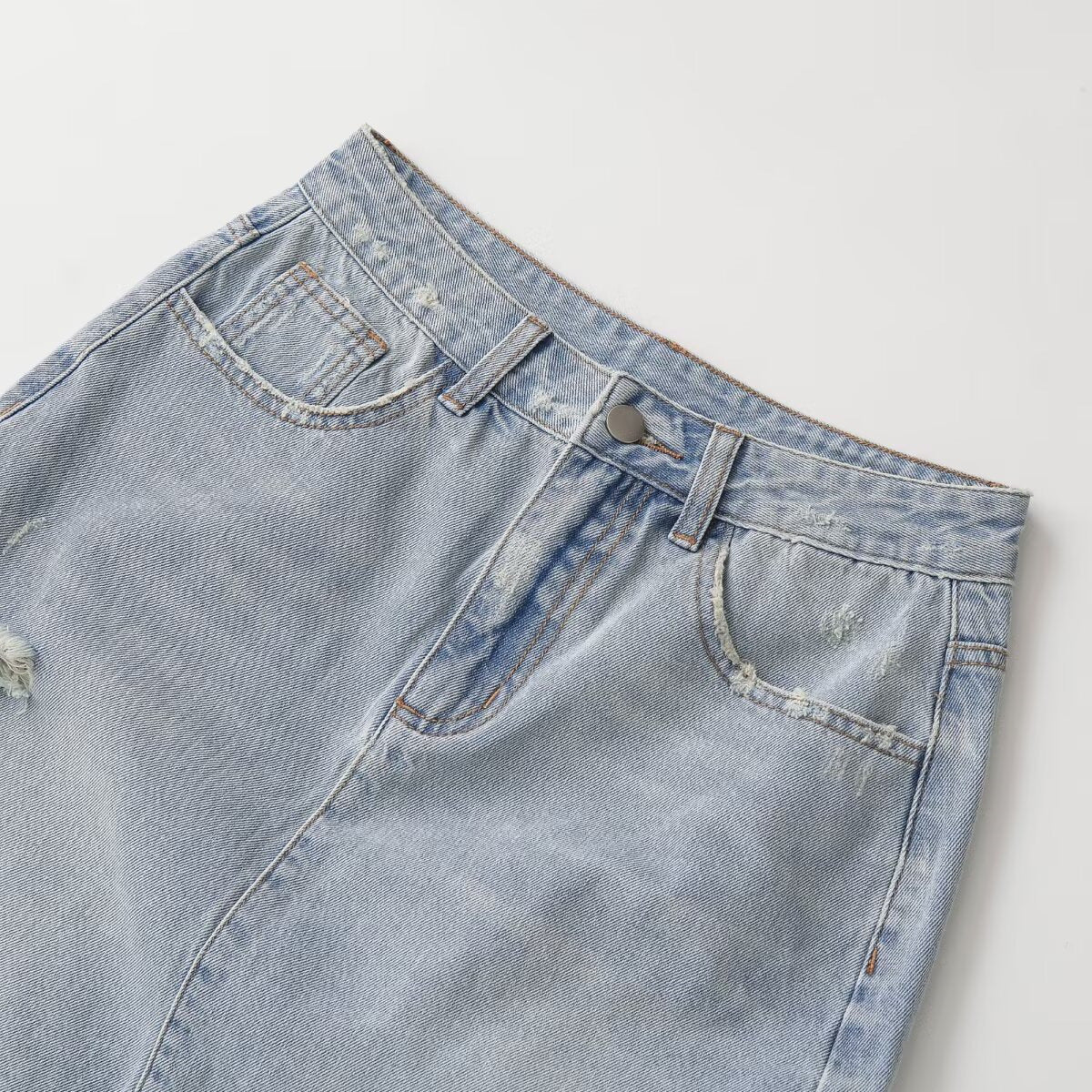 Mid waist perforated casual denim skirt by eprolo