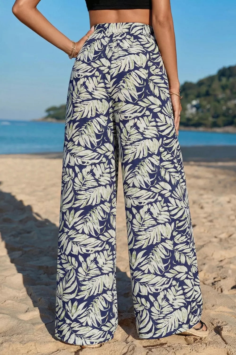 Leaf Print Wide Leg Pants by Trendsi